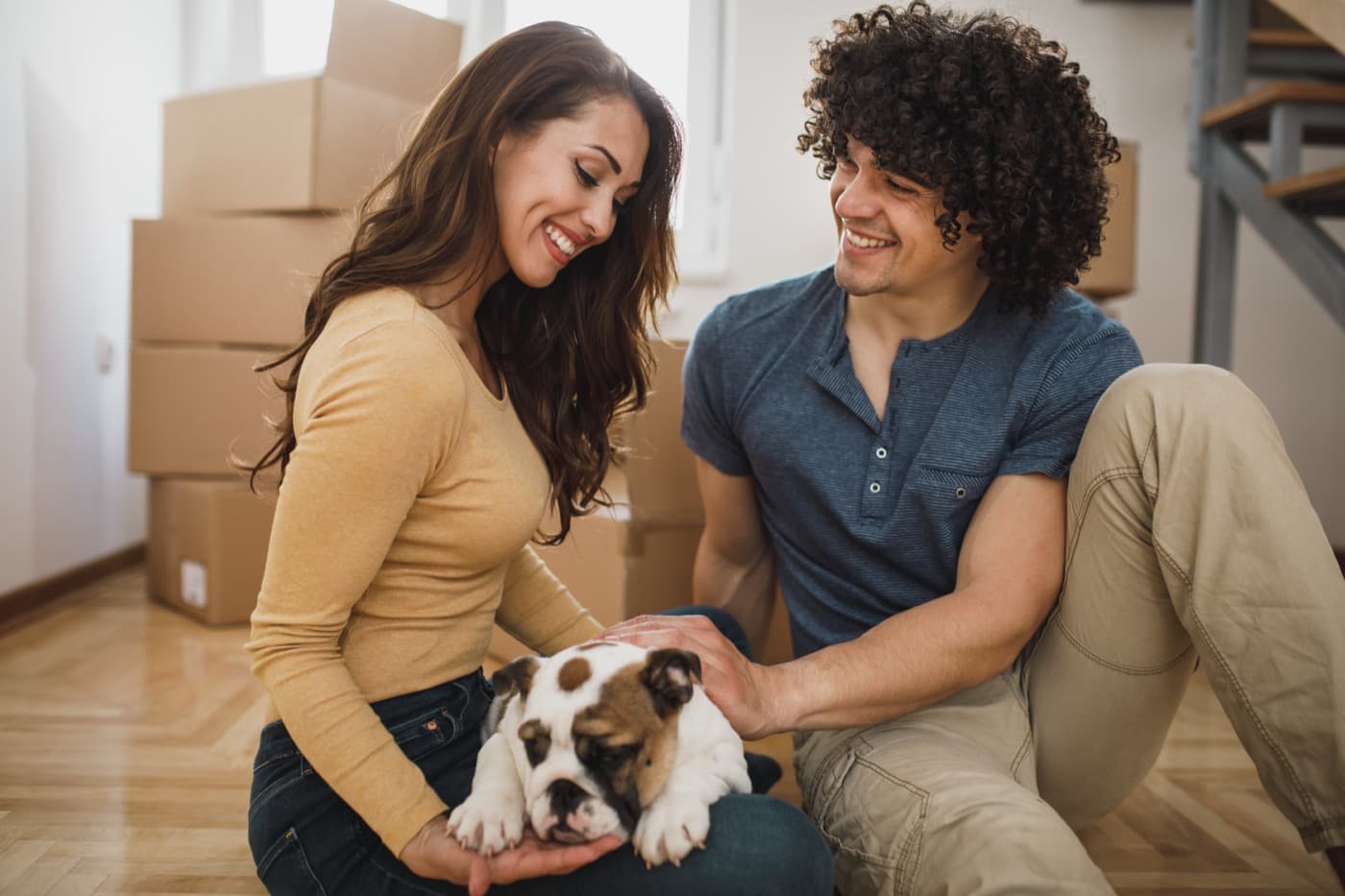 Pet parent with their dog at home